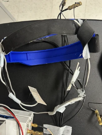 Close-up view of the head-mounted RMG sensor system with cheek and chin sensors.